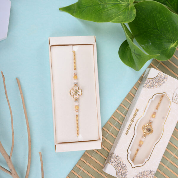 PREMIUM GOLD FLOWER AD RAKHI